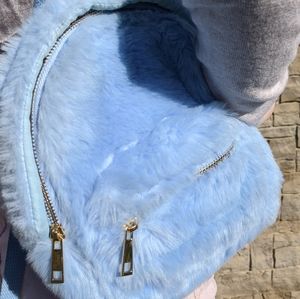 baby blue faux fur mini backpack